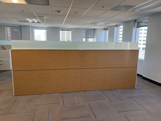 Teknion workstations with wood panels and glass