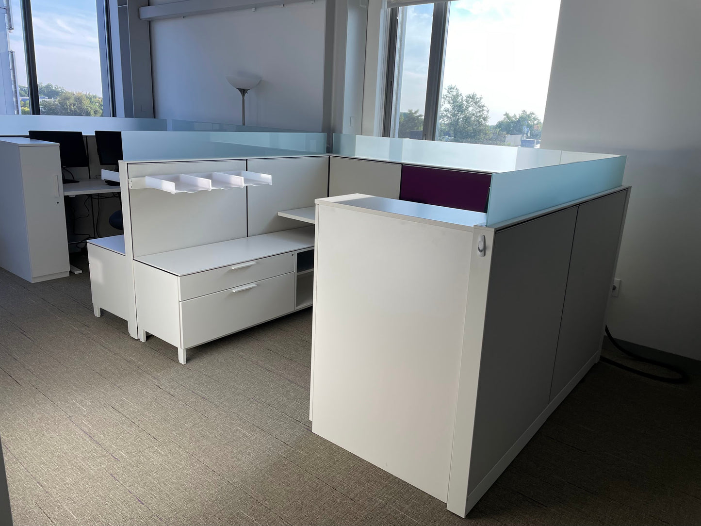 Load image into Gallery viewer, Picture of Herman miller canvas cubicle system with white and purple panels and frosted glass
