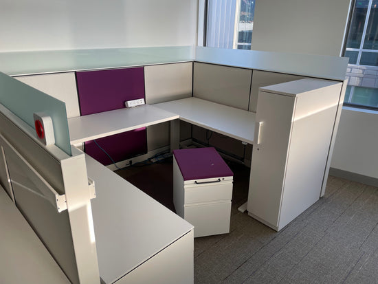 Load image into Gallery viewer, Picture of Herman miller canvas cubicle system with white and purple panels, ped and wardrobe
