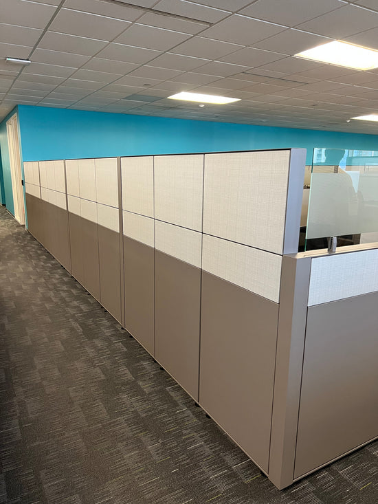 Haworth Compose cubicle workstations with tall panels and glass