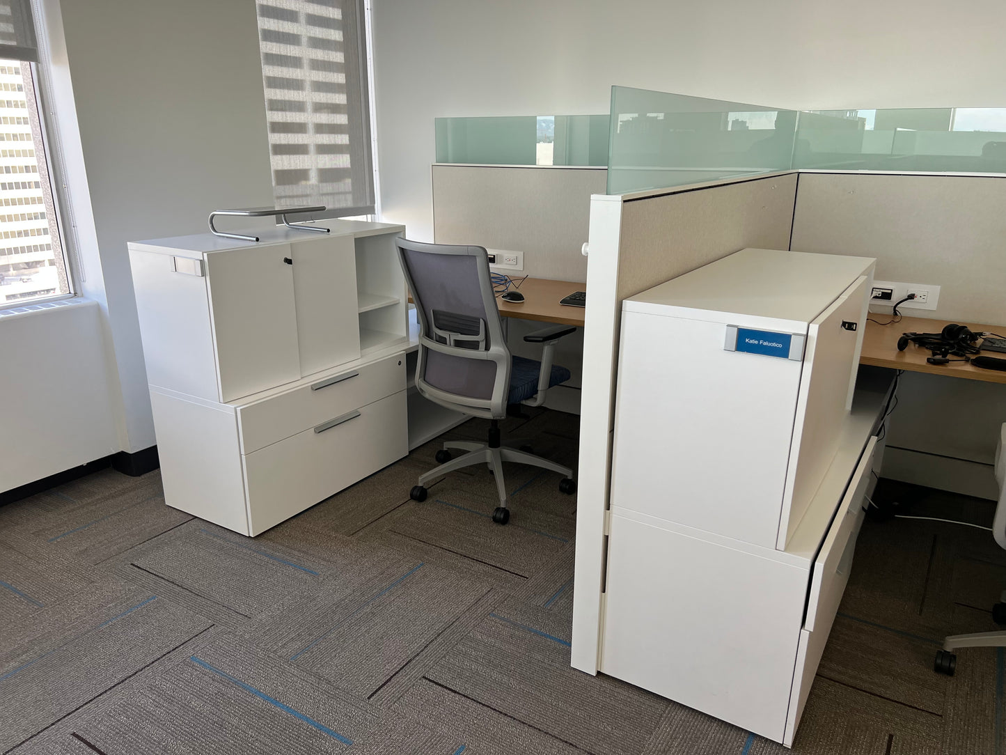 Teknion workstations with double storage and glass