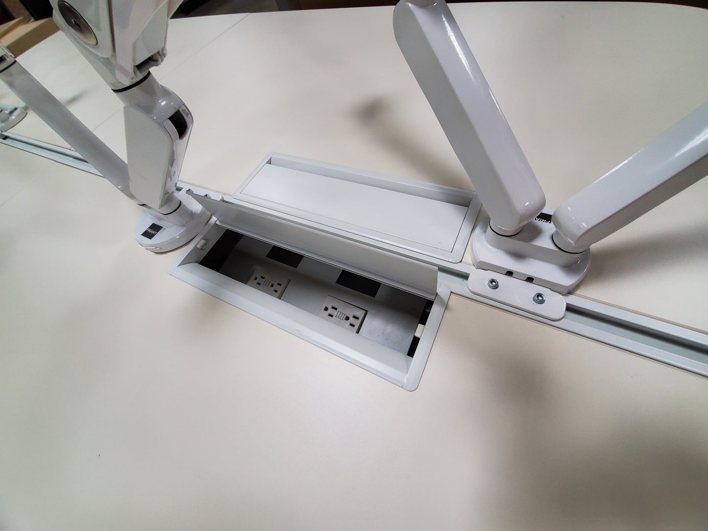 Friant benching workstations with hidden power outlets